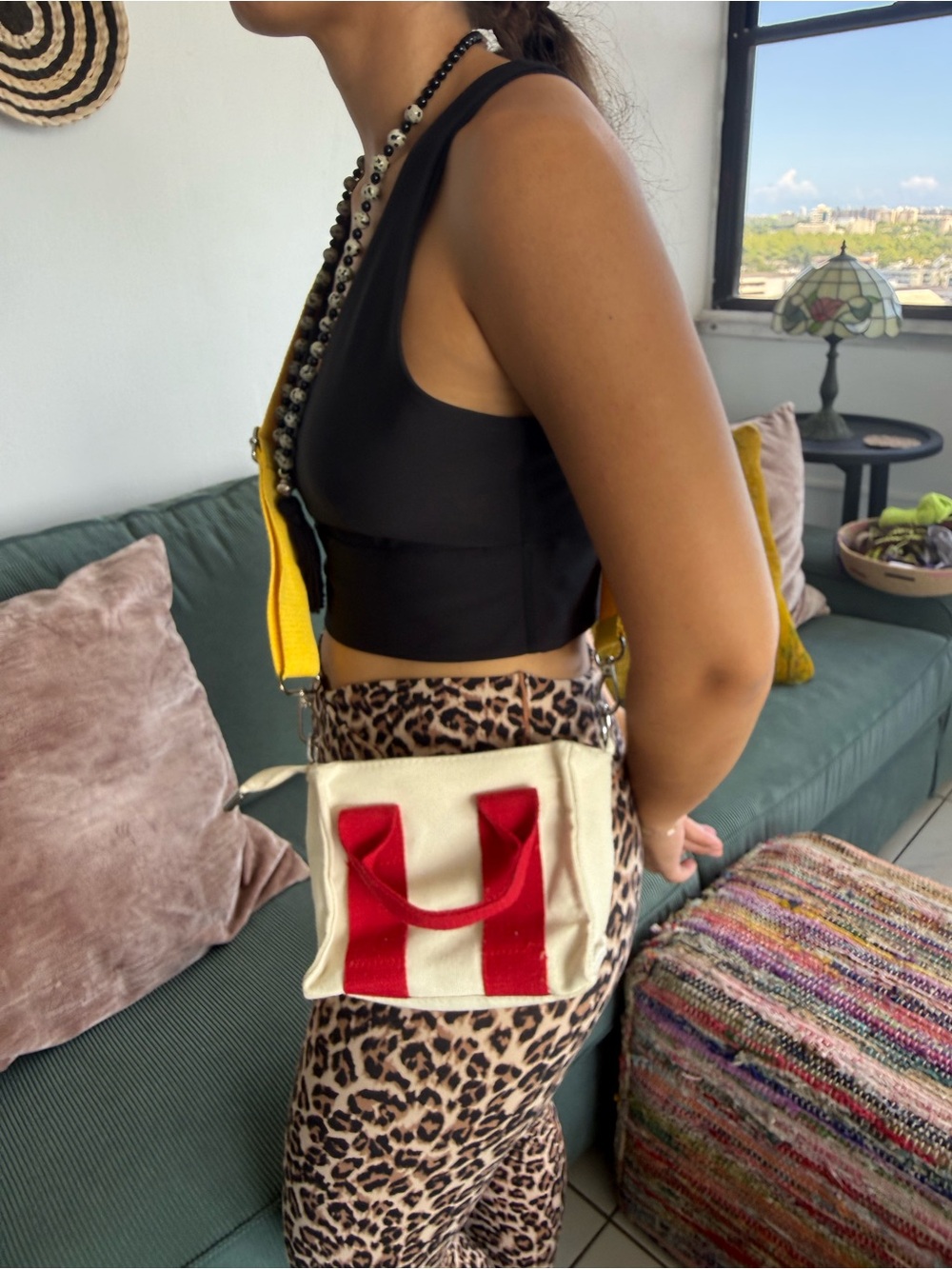 Canvas Crossbody Bag with Red Accent and Yellow Strap